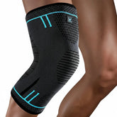 Genouillère de compression portée sur le genou, soutien musculaire et maintien articulaire pour le sport
