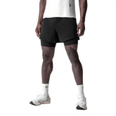 Short de sport respirant homme noir avec cuissard intégré, vue de face