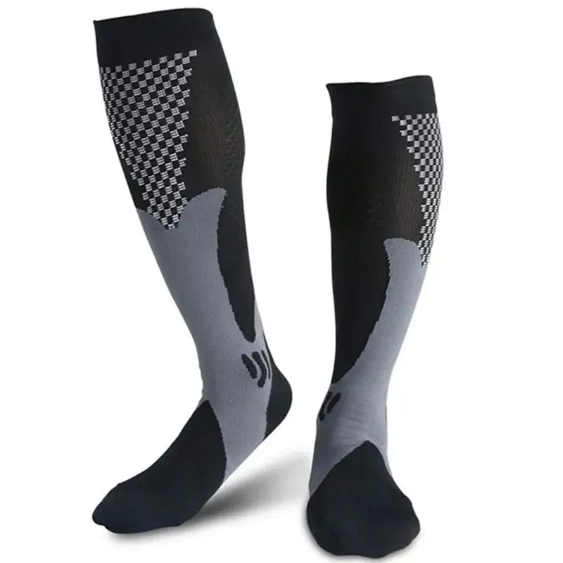 Chaussettes de compression sport noires et grises pour soutien musculaire et performance sportive